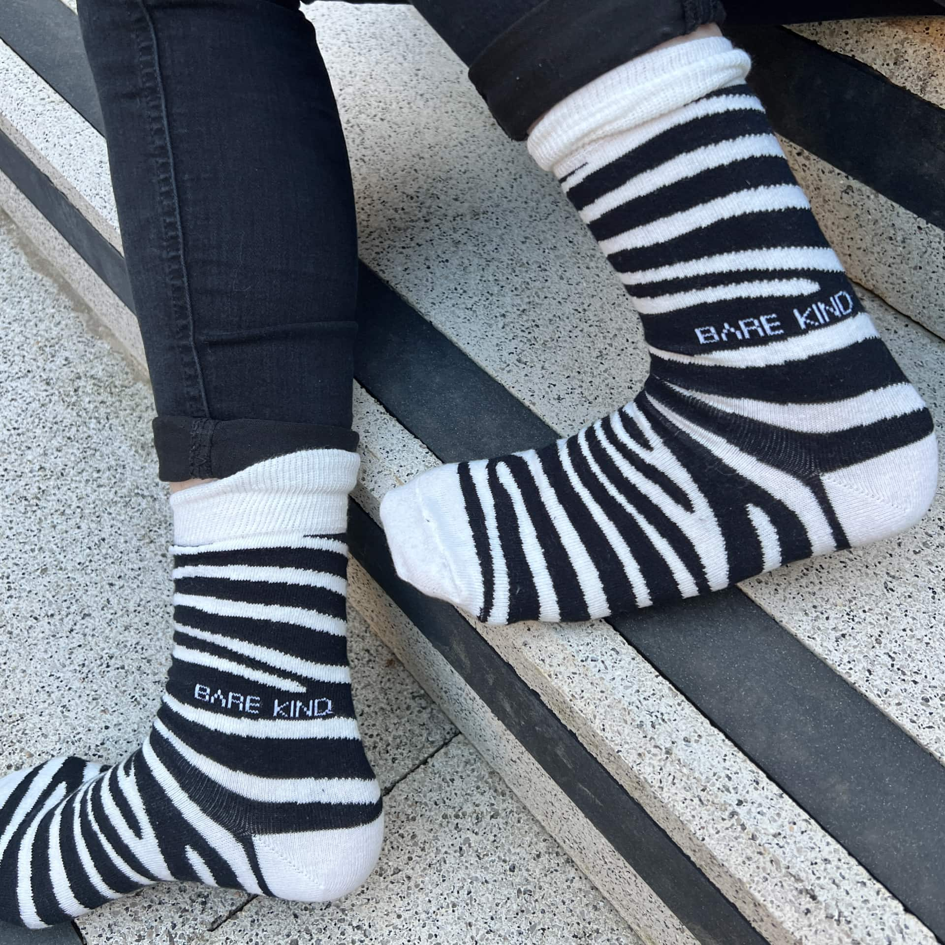 model wearing zebra print bamboo socks