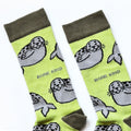 cuff closeup flat lay of green seal socks