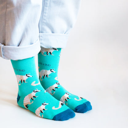 standing model, side angle view, wearing bright blue numbat socks