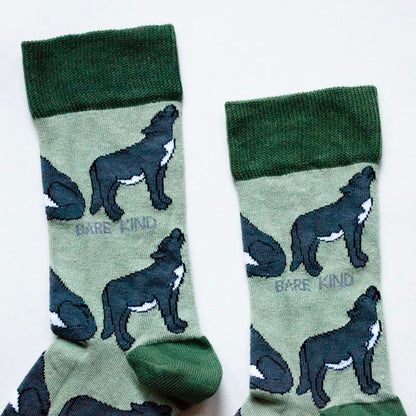 cuff closeup flat lay of green bamboo wolf socks